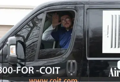 COIT Team member in van.